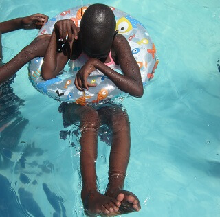 child with disability swimming